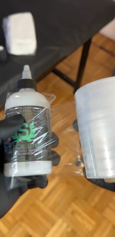 Stencil solution bottle and protective wrap prepared at MORSE INK